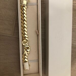 Gold icelink bracelet with stones